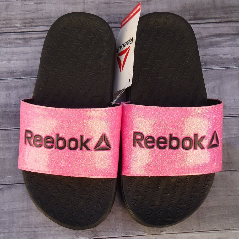 NWT. SIZE 1. Reebok dual density slide sandals.